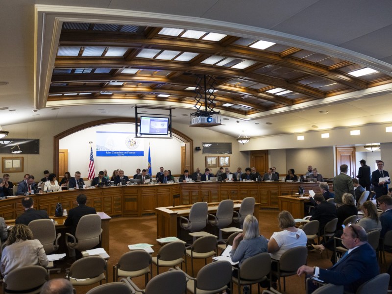 People meet in a large room.